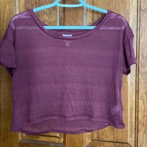 cropped slightly transparent purple patterned top